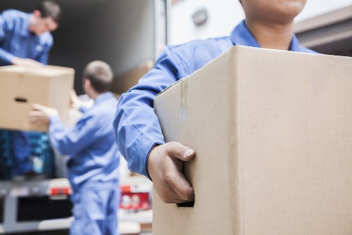 Van and moving boxes representing Sutton man and van service
