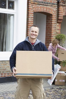 House removals team preparing a move in Sutton residential street