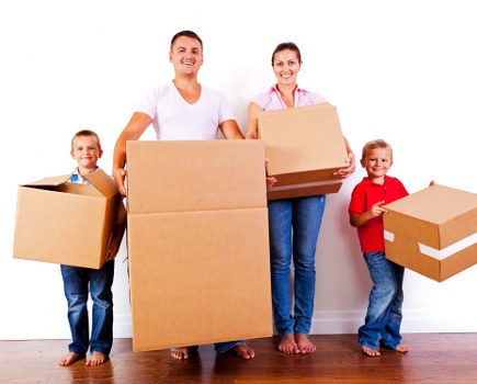 Removal van and moving boxes representing home removals in Sutton