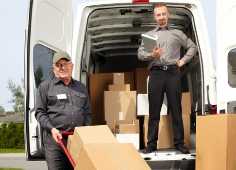 Furniture pick-up service handling a sofa collection in Sutton
