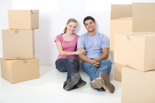 Removal van for a local Sutton home move near apartment buildings
