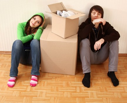 Moving van and packed boxes for a local Sutton home removal