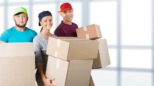 Professional movers handling a home relocation in Sutton
