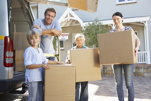 Packed boxes and prepared rooms for a house move in Sutton