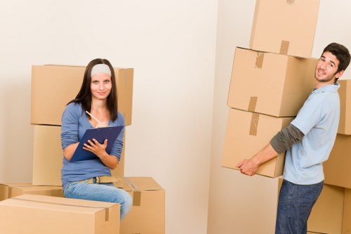 Commercial movers handling desks and workstations in Sutton